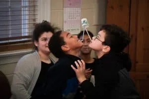 Shabbat School Children Try to Pass A Cup With Straws Shabbat School Children Try to Pass A Cup With Straws